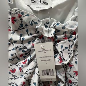Bebé floral ruffle bib dress